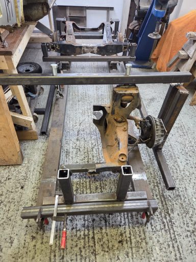 Front drivers side suspension mounted on chassis jig